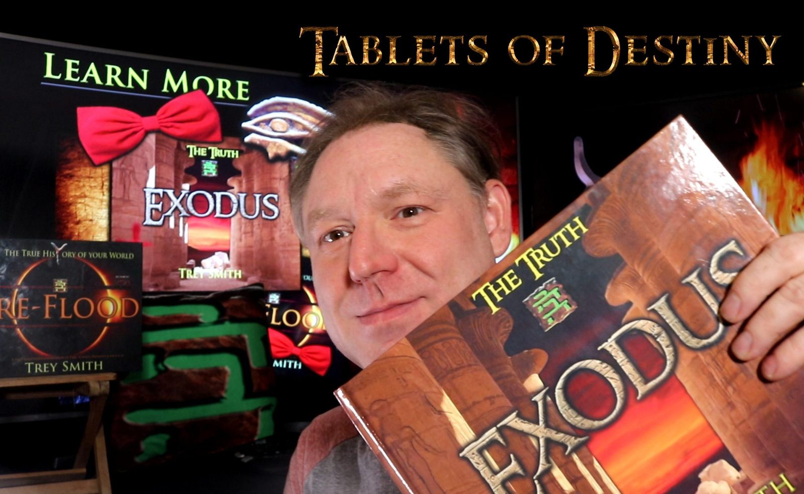 Trey Smith holding the Exodus book in front of a Tablets of Destiny and Learn More banner - Signs intro summary article